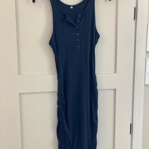 Ribbed, jersey knit material with ruching, tie hem.